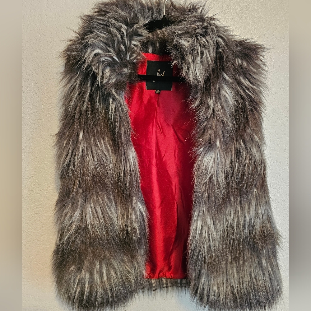 Faux fur medium vest with pockets